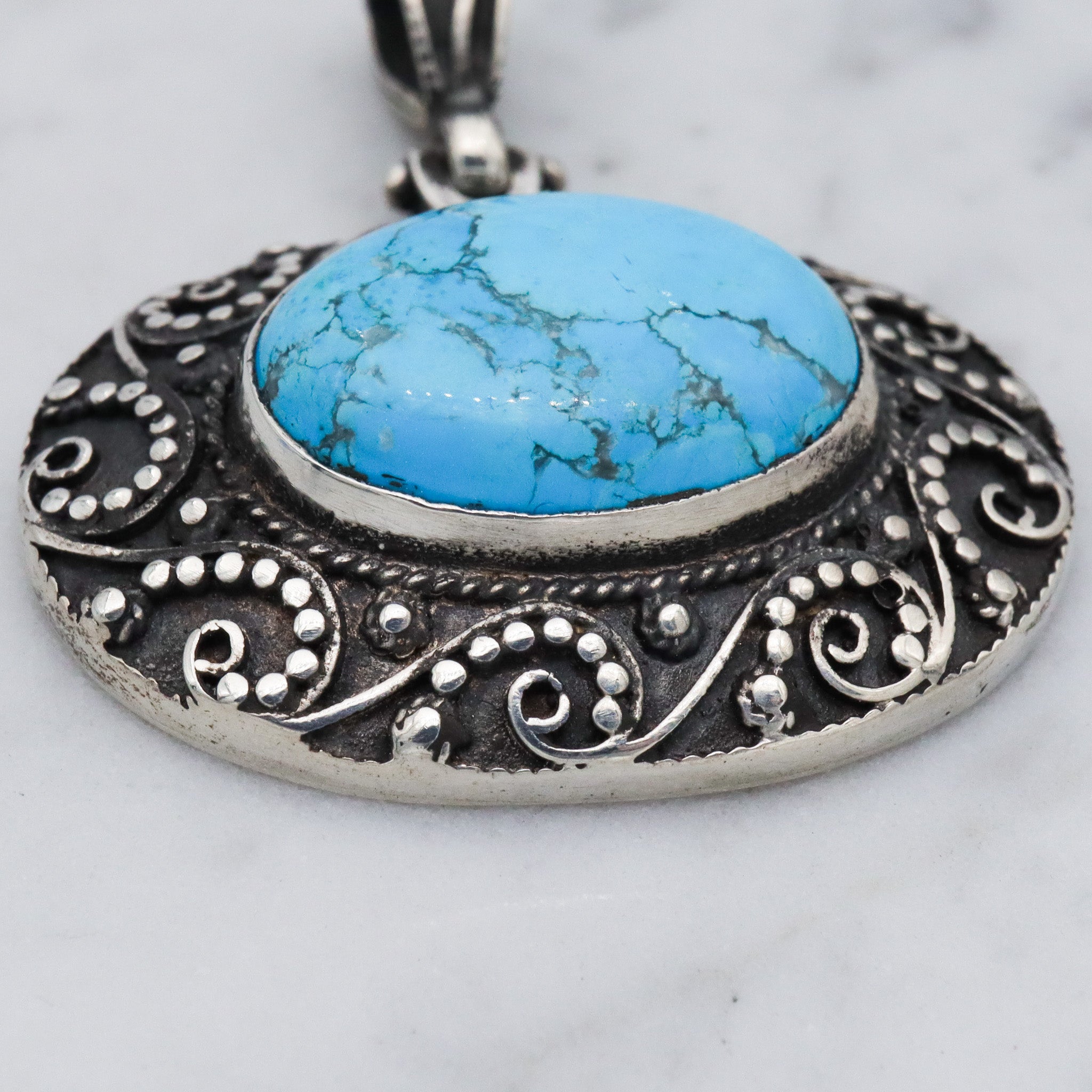 Vintage sterling silver turquoise and applied bead work pendant